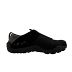 Black slip-on shoe on a white background