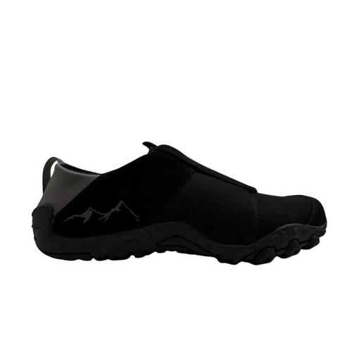 Black slip-on shoe on a white background